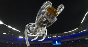 The Champions League trophy is thrown in the air after the UEFA Champions League final match between Liverpool FC and Real Madrid at Stade de France on May 28, 2022 in Paris, France.