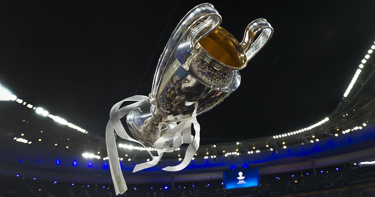 The Champions League trophy is thrown in the air after the UEFA Champions League final match between Liverpool FC and Real Madrid at Stade de France on May 28, 2022 in Paris, France.