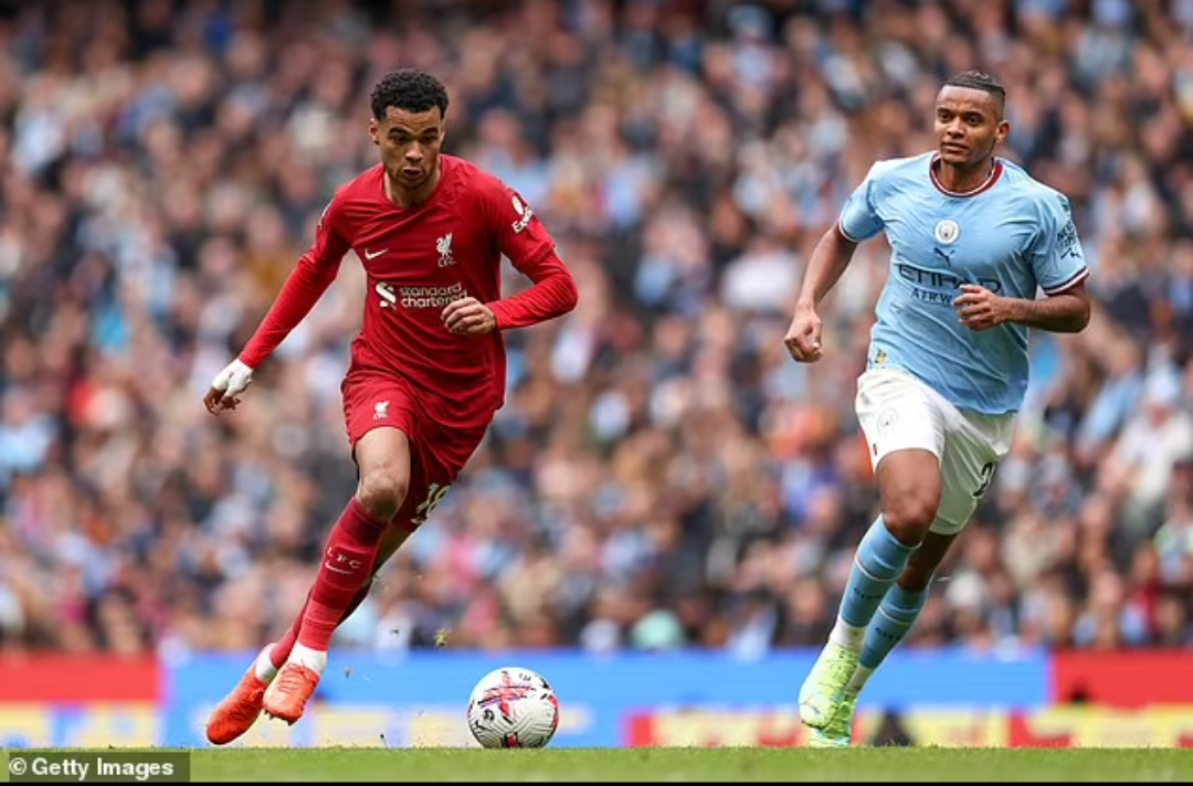 Manchester City thrashes Liverpool 4-1 to keep in touch with Arsenal at top of English Premier League