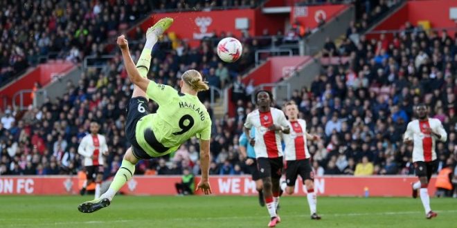 Erling Haaland scores an acrobatic effort for Manchester City against Southampton in the Premier League in April 2023.