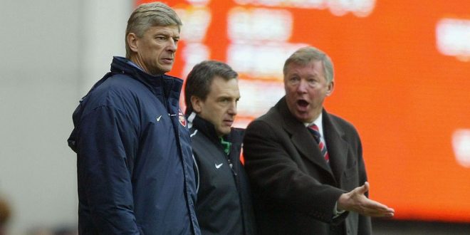 Manager Arsene Wenger of Arsenal argues with manager Sir Alex Ferguson of Manchester United during the FA Barclaycard Premiership match between Arsenal and Manchester United at Highbury on March 28, 2004 in London.
