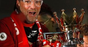 Jurgen Klopp, Liverpool manager, celebrating with the Premier League trophy
