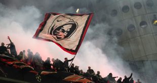 AC Milan fans at the San Siro for the Champions League first leg semi-final game against Inter