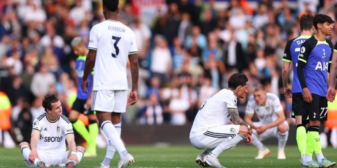 Leeds United players look dejected after a 4-1 loss at home to Tottenham sees them lose their Premier League status in May 2023.