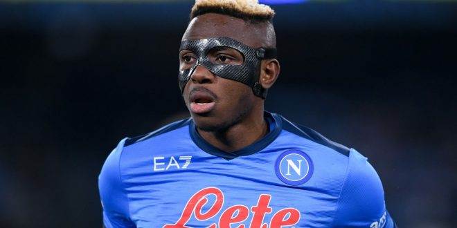 Napoli striker Victor Osimhen, wearing a protective face mask