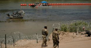 Biden administration warns Texas over floating barriers at border