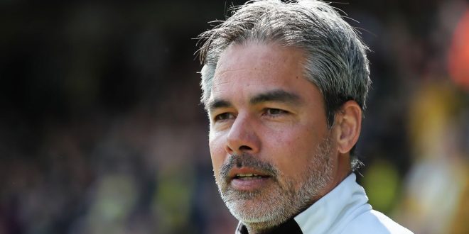 Norwich City head coach David Wagner looks on from the touchline during a match