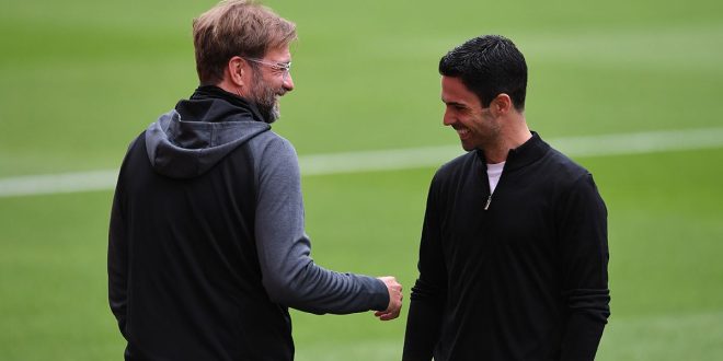 Liverpool and Arsenal managers Jurgen Klopp and Mikel Arteta respectively before the Premier League match between Arsenal FC and Liverpool FC at Emirates Stadium on July 15, 2020 in London, England.