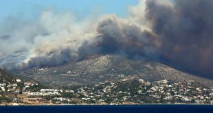 Residents flee Greek seaside villages as the dry, hot days leave them vulnerable to wildfires.