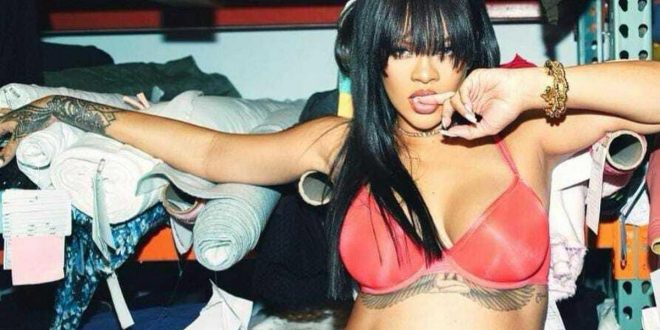 Rihanna shows off her baby bump in new lingerie photos