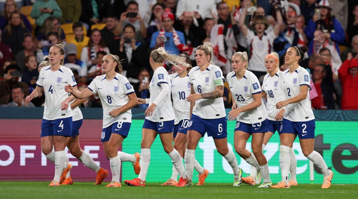 England women players celebrate after a goal at the 2023 Women