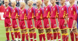 Romania: The bleach blonde Romanians line up before the World Cup group E game against Tunisia at the Stade de France in St Denis. Romania finished top of their group as the match ended 1-1.