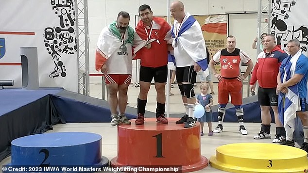 Iranian weightlifter is given lifetime ban by Islamic regime after he shook hands with Israeli competitor at international event
