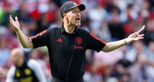 Manchester United manager Erik ten Hag gestures on the touchline during a friendly match
