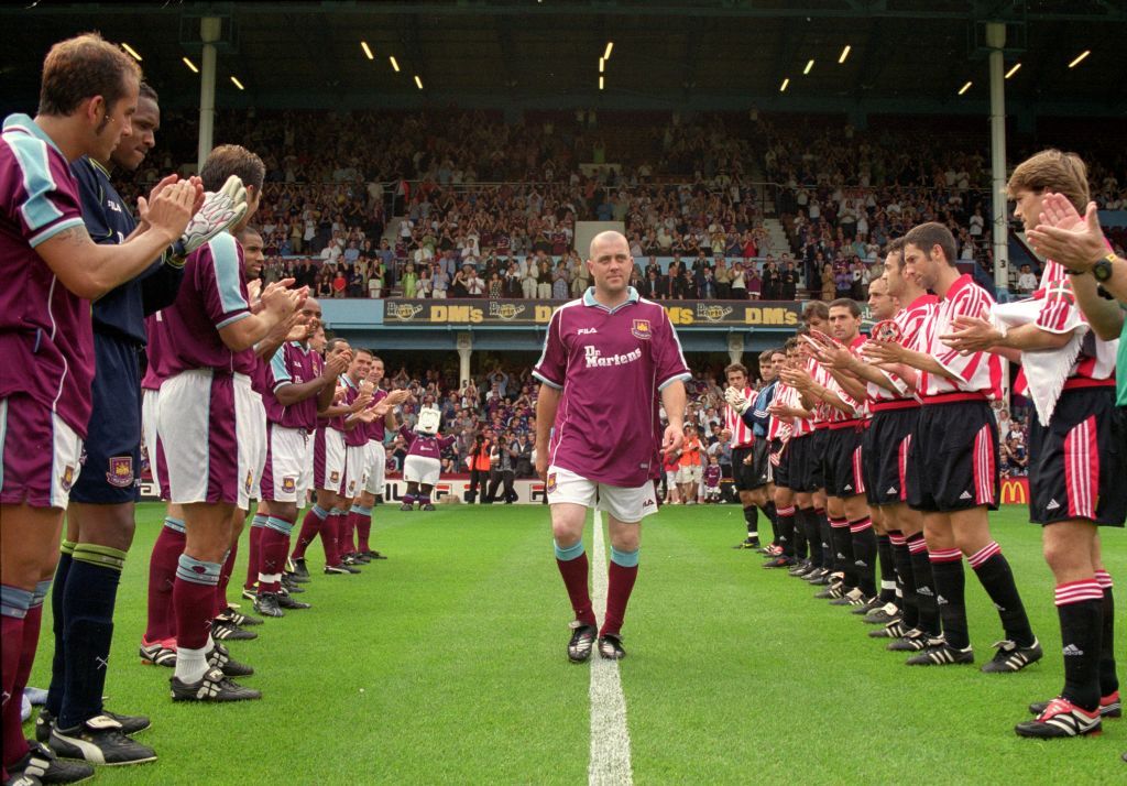 Julian Dicks is applauded by the two teams before his Benefit match between West Ham United and Athletic Bilbao at Upton Park in London.  Mandatory Credit: Jamie McDonald /Allsport