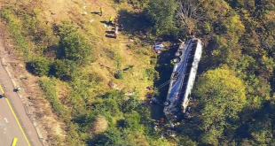 At least 1 dead, dozens injured as bus transporting high school students crashes on the way to band camp