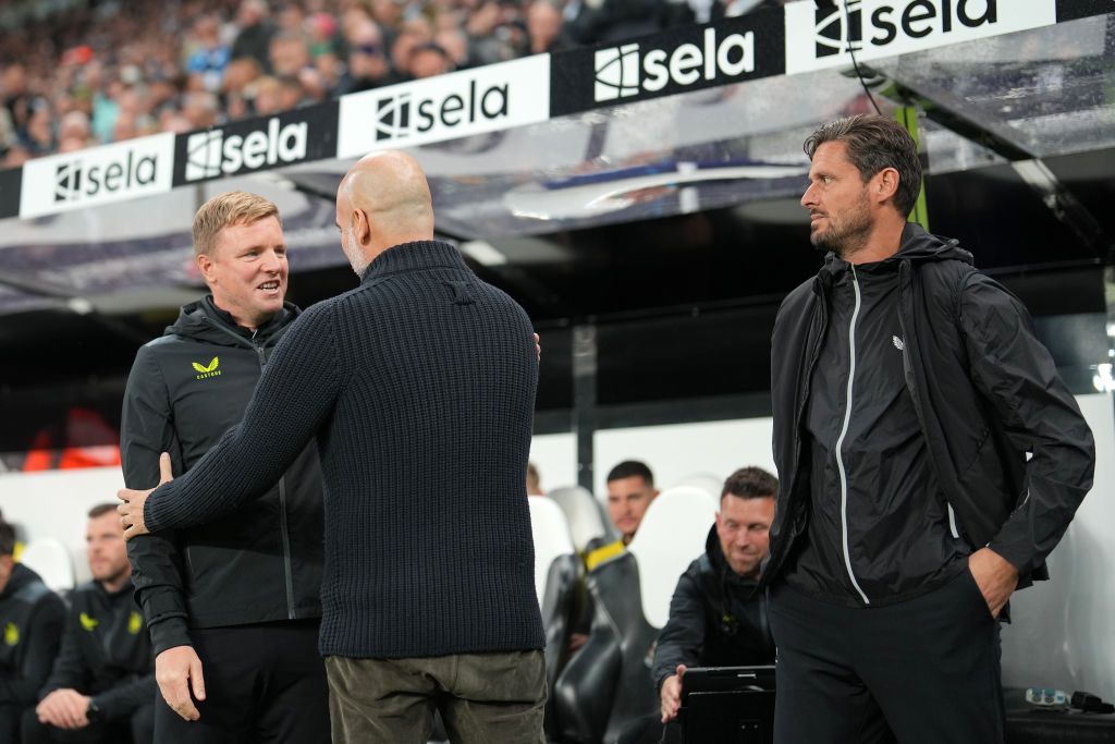 Pep Guardiola, Manager of Manchester City, speaks to Eddie Howe, Manager of Newcastle United, prior to the Carabao Cup Third Round match between Newcastle United and Manchester Cityat St James