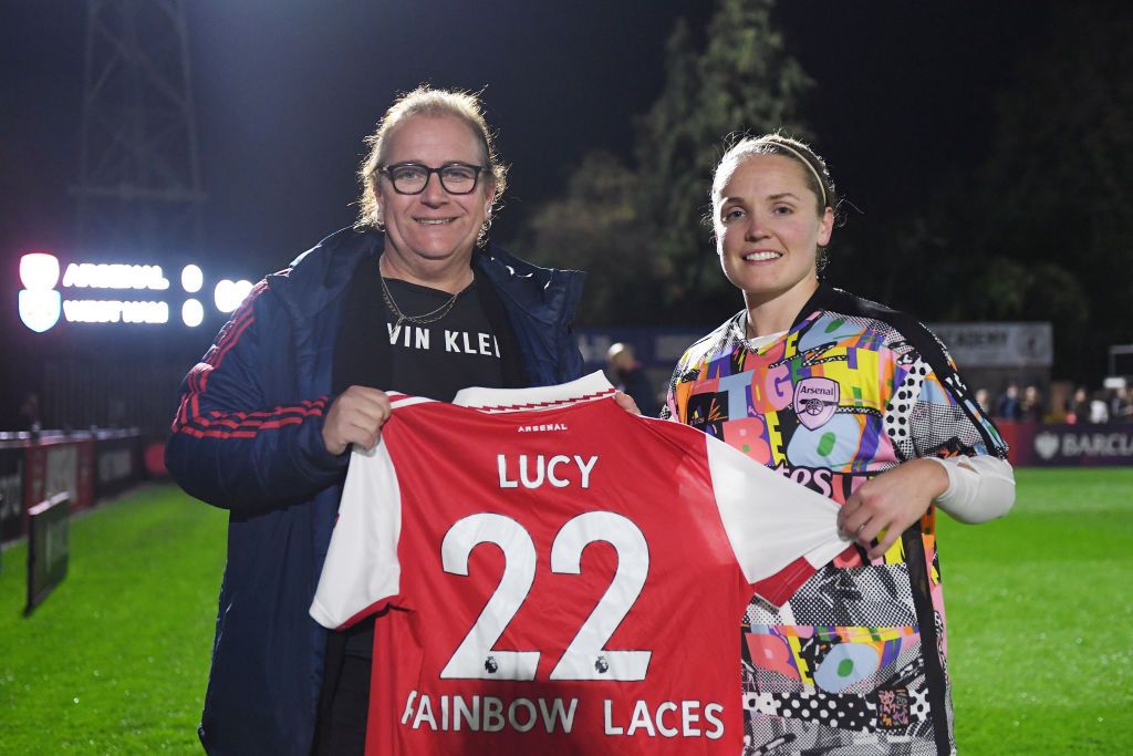 Football Referee Lucy Clark is presented with a Rainbow Laces Arsenal home shirt by Kim Little, Captain of Arsenal prior to the Barclays FA Women