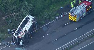 Girl, 14, and driver are killed in horror school bus crash in UK as thirteen children are taken to hospital with two seriously�injured