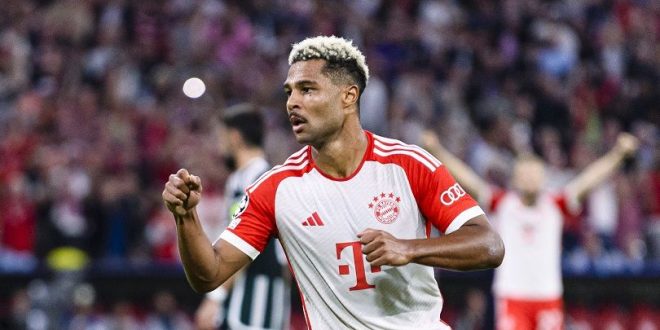 Serge Gnabry celebrates scoring for Bayern Munich against Manchester United in the UEFA Champions League