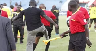 Players and supporters attack referee over