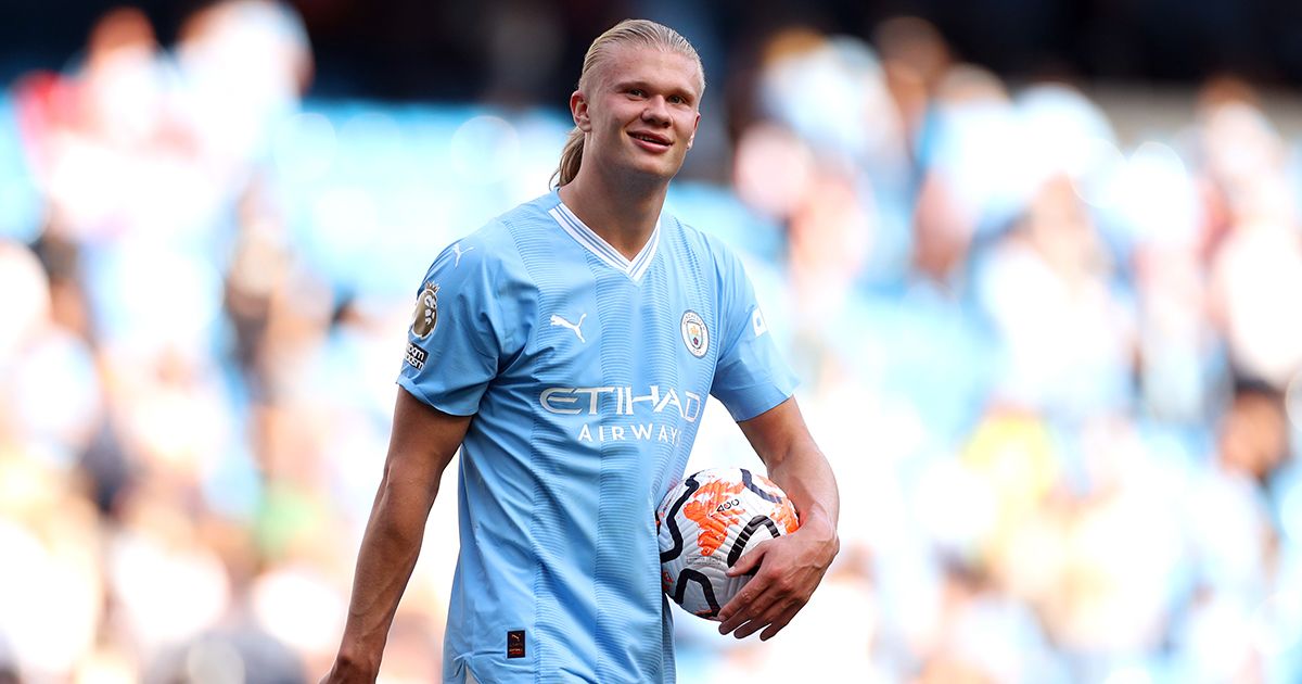 Manchester City star Erling Haaland carries the matchball after scoring a hat-trick during the Premier League match between Manchester City and Fulham FC at Etihad Stadium on September 02, 2023 in Manchester, England.