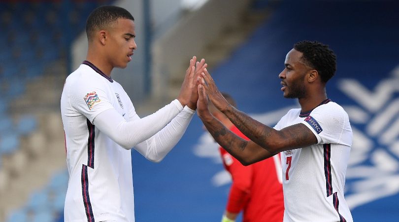 Mason Greenwood celebrates with Raheem Sterling on his England debut against Iceland in 2020.
