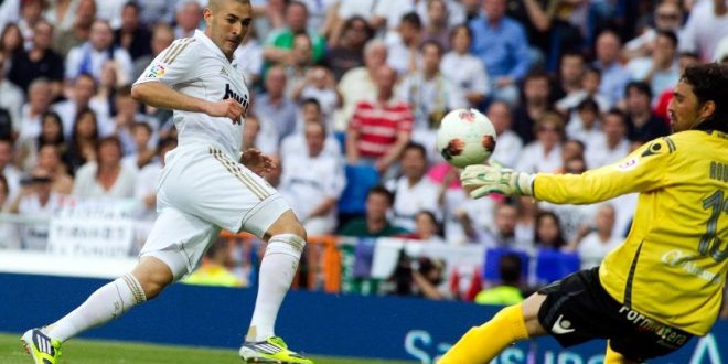 Karim Benzema vies with Dudu Aouate in a La Liga game between Real Madrid and Mallorca in 2012.