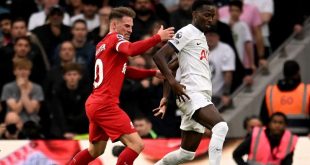 Liverpool midfielder Alexis Mac Allister challenges Tottenham