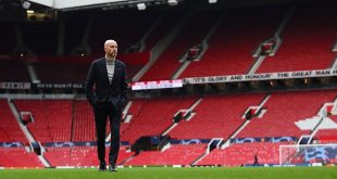 Manchester United manager Erik ten Hag walks on the pitch before the UEFA Champions League match between Manchester United and F.C. Copenhagen at Old Trafford on October 24, 2023 in Manchester, England.