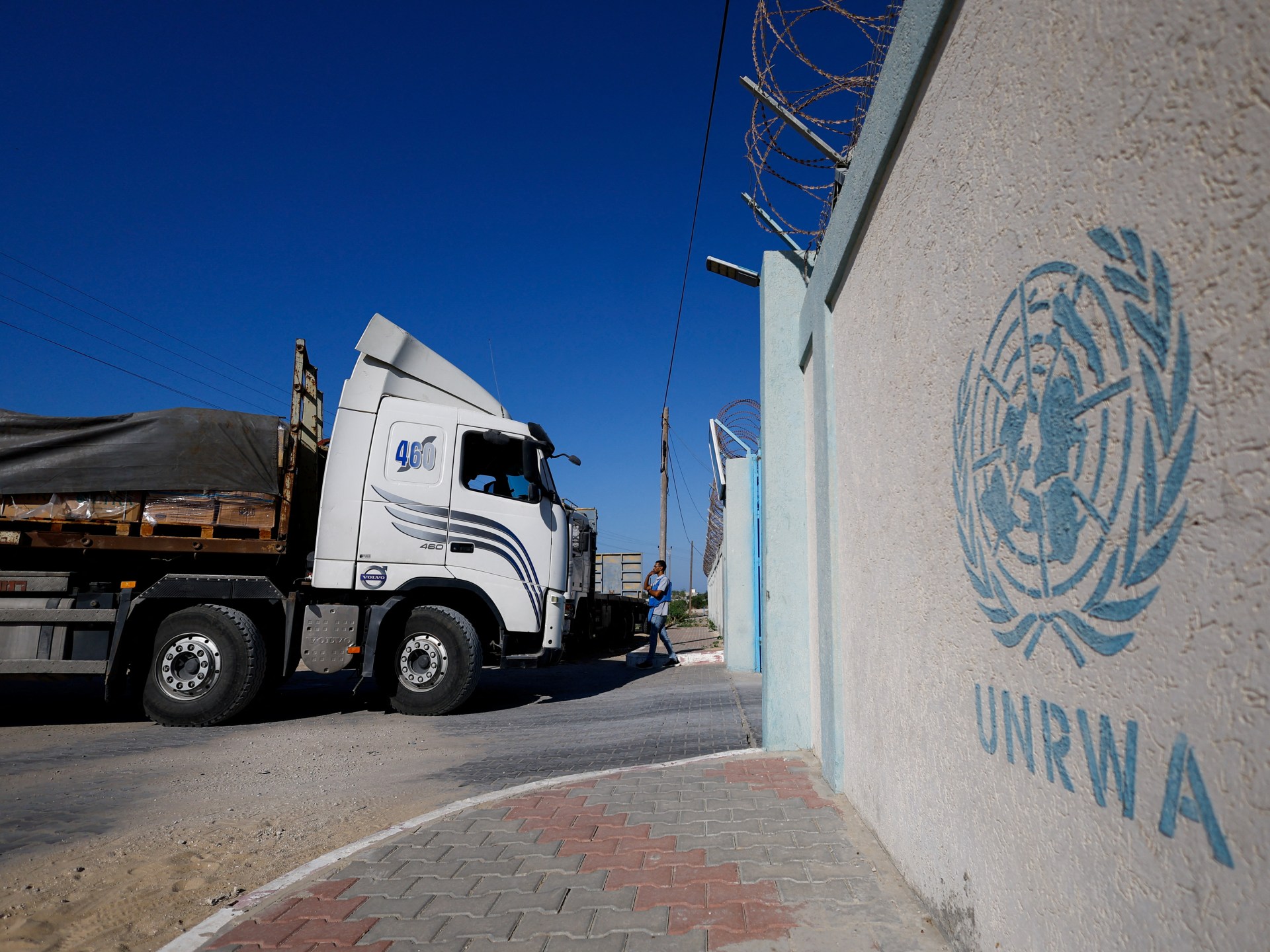 Photos: Limited aid enters Gaza as Israeli bombing compounds dire situation