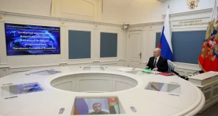 Putin watches as Russian military rehearse