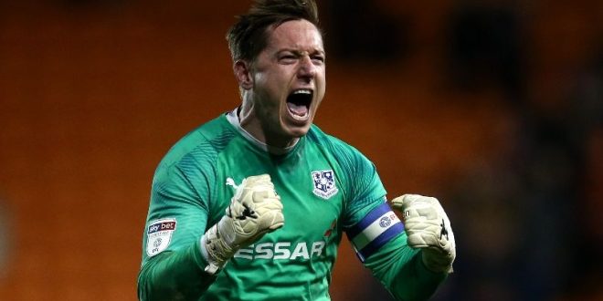 Tranmere Rovers goalkeeper Scott Davies celebrates a victory over Blackpool in 2020.