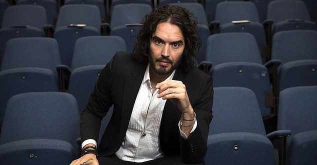 Comedian Russell Brand is quizzed by police over