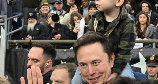 Elon Musk attends Army-Navy game with rarely seen son X � A-Xii amid custody battle with former partner Grimes (photos)