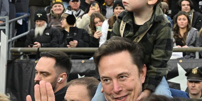 Elon Musk attends Army-Navy game with rarely seen son X � A-Xii amid custody battle with former partner Grimes (photos)
