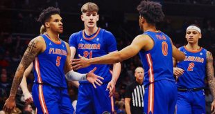 Florida holds off Michigan in double OT thriller