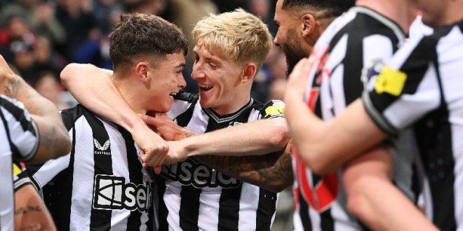 Lewis Miley is congratulated by Anthony Gordon after scoring for Newcastle against Fulham in December 2023.