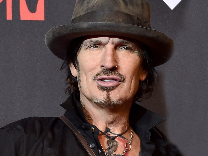 Musician Tommy Lee sued for allegedly sexually assaulting woman in helicopter
