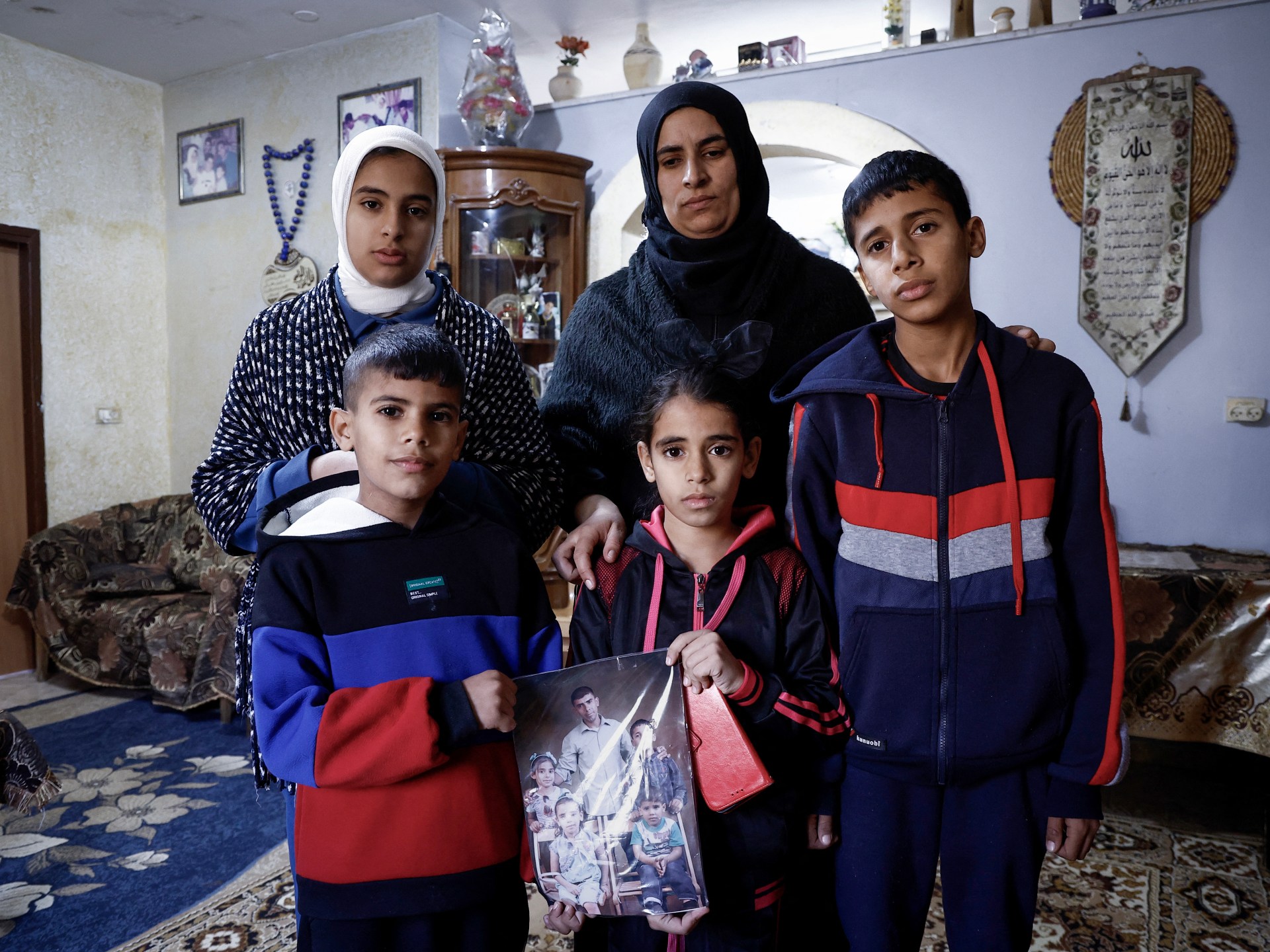Photos: West Bank family sees no hope of justice in settler killings