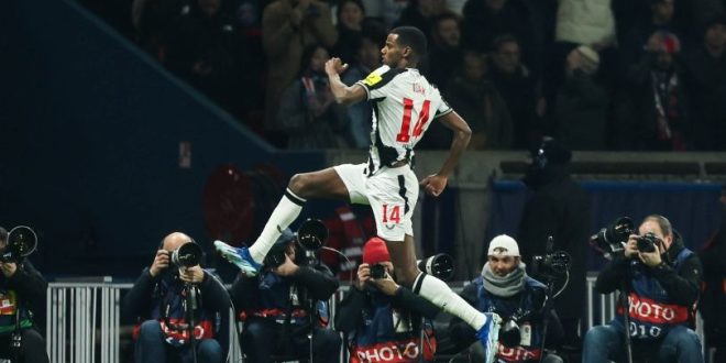 Alexander Isak celebrates scoring against Paris Saint-Germain