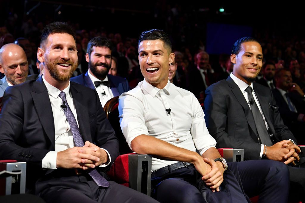 Cristiano Ronaldo of Juventus, Lionel Messi of FC Barcelona and Virgil Van Dijk of Liverpool react during the UEFA Champions League Draw, part of the UEFA European Club Football Season Kick-Off 2019/2020 at Salle des Princes, Grimaldi Forum on August 29, 2019 in Monaco, Monaco. (Photo by Harold Cunningham - UEFA/UEFA via Getty Images)
