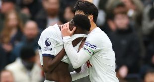 Pape Matar Sarr is consoled by Son Heung-min after going off injured in Tottenham