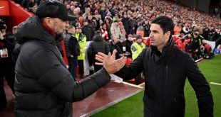 Liverpool manager Jurgen Klopp greets Arsenal boss Mikel Arteta during the teams