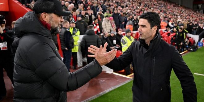 Liverpool manager Jurgen Klopp greets Arsenal boss Mikel Arteta during the teams