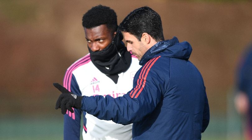 Mikel Arteta gives instructions to Eddie Nketiah during an Arsenal training session in January 2023.