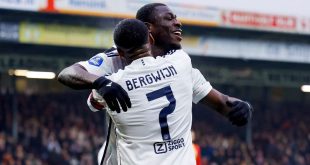 Brian Brobbey celebrates with Steven Bergwijn after scoring for Ajax against Go Ahead Eagles in January 2024.