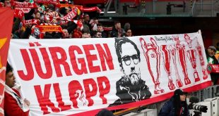 Liverpool fans hold up a banner dedicated to manager Jurgen Klopp ahead of the Reds