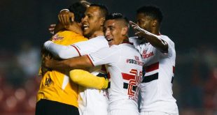 Rogerio Ceni celebrates with Sao Paulo team-mates in a match against Santos in 2015.