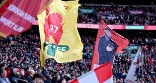 Liverpool fans wave flags at Wembley during the Carabao Cup final